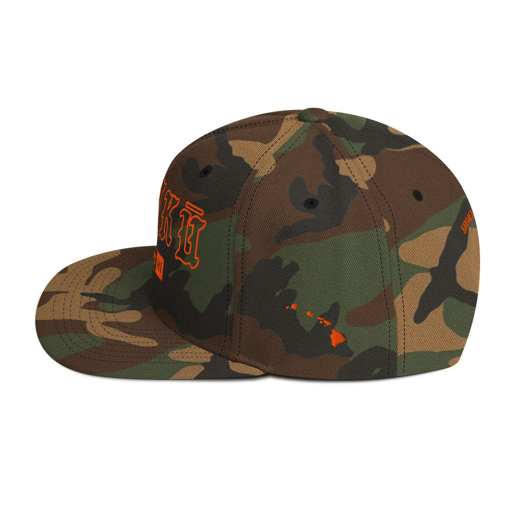 HaʻIkū Snapback Hat — Green Camo — orange embroidery — left side view