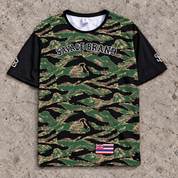 Front of the Lahaina 61 short-sleeve jersey in tiger camo, with Savage Brand across the chest and black sleeves.